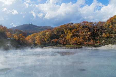 Noboribetsu Onsen is Hokkaido's most famous hot spring resort. A large amount of Noboribetsu's many types of hot spring water surfaces in the spectacular Jigokudani orの写真素材