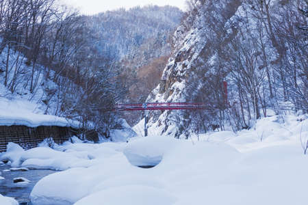 Jozankei Onsen is located inside Shikotsu-Toya National Park between the high cliffs of the Toyohira River. The town is only one hour outside central Sapporo, making it a popular side trip from the city. It is one of the most popular places for tourist.の写真素材