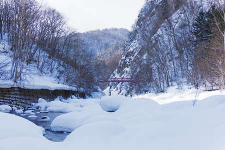 Jozankei Onsen is located inside Shikotsu-Toya National Park between the high cliffs of the Toyohira River. The town is only one hour outside central Sapporo, making it a popular side trip from the city. It is one of the most popular places for tourist.の写真素材
