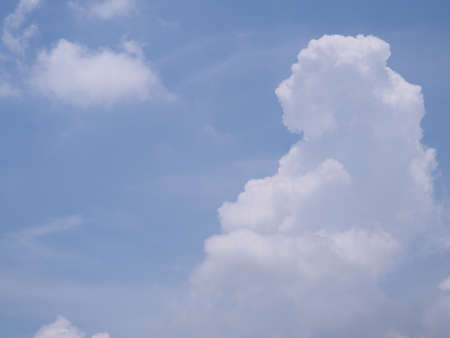 Bright sky with beautiful white cloudsの写真素材
