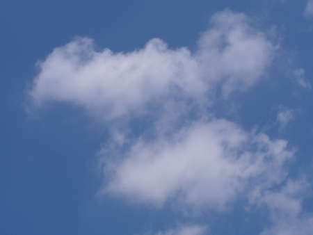 Blue sky white flies throughの写真素材