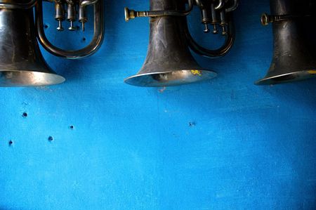trumpets on blue wallの写真素材