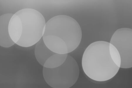 Bokeh background black and white - Change the color what you want.の写真素材