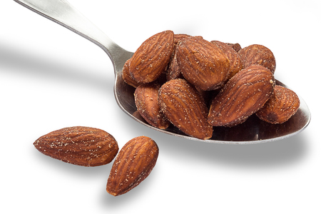 close up shot of the almond on white background.の写真素材