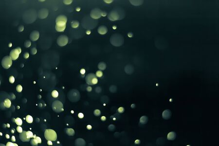 Bokeh background dark greenの写真素材