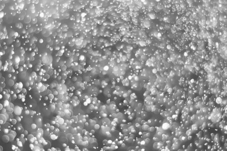Bokeh Background black and white - Change the color what you want.の写真素材