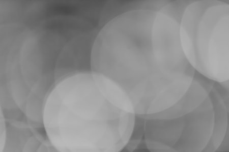 bokeh background black and white - you can change the color what you want by layer mode sush as 'Soft light, Overlay, etc'の写真素材