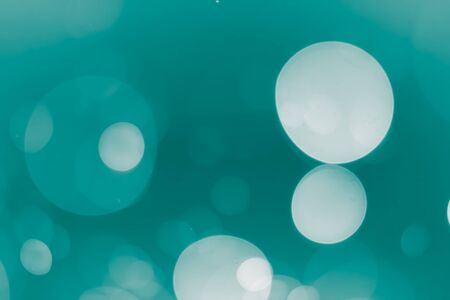 abstract bokeh background teal colorの写真素材