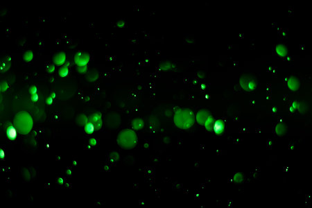 abstract bokeh background dark green color