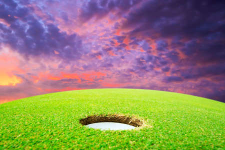 golf hole on a fieldの写真素材