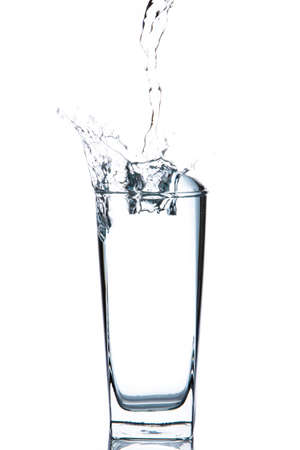 water splash in glasses on whiteの写真素材