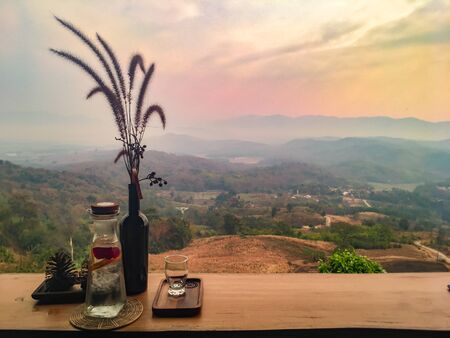 The landscape of mountains is full of clouds and fog. A top view of the haze in the mountains And fog in the morning at Doi Sako Mountain, Chiang Saen, Thailandの写真素材