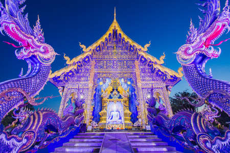 Chiang Rai, Thailand - 25 July 2020: Beauty of Blue Temple or Rong Suea Temple at dusk. Chiang Rai Province, Thailandのeditorial素材