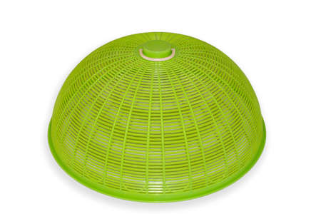 Green plastic food net cover (cover or lid) on white background.の写真素材