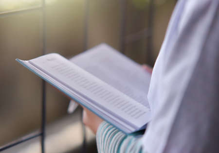 Open book on the table in libraryの写真素材