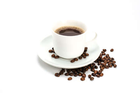 coffee cup and coffee beans on a white backgroundの写真素材