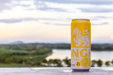 Chiang Rai, Thailand - 6 Nov 2021 : A can of Singha Lemon Soda, a product from "SINGHA", blurred background, Singha Park, Chiang Rai.のeditorial素材