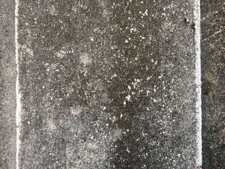 Old wall with decayed plaster cement and peeling texture background of cement color wallpaperの写真素材