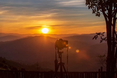 Colorful sunset over the mountain hills Thailand