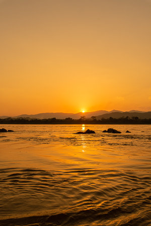 Sunset on the Mekong River in Laos. Landscape.の写真素材