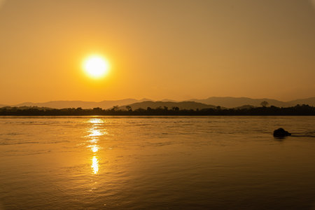 Sunset on the Mekong River in Laos. The Mekong River is the longest river in Laos.の写真素材