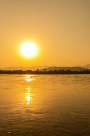 Sunset over the Mekong River in Laos. Landscape.の写真素材