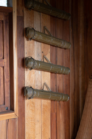 Close up view of a row of old lanterns in a wooden doorの写真素材