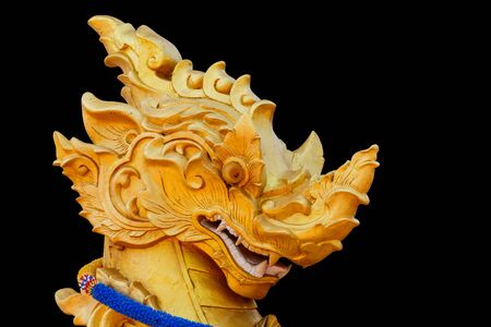 statue head lion thai black backgroundの写真素材