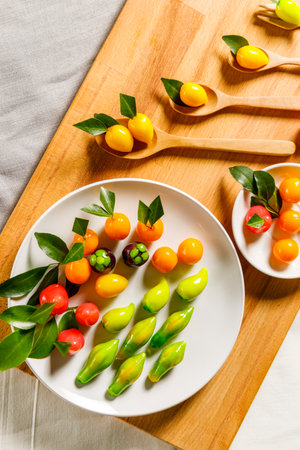 Deletable Imitation Fruits on wooden plateの写真素材