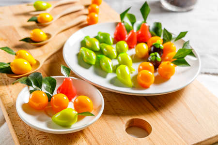 Deletable Imitation Fruits on wooden plateの写真素材