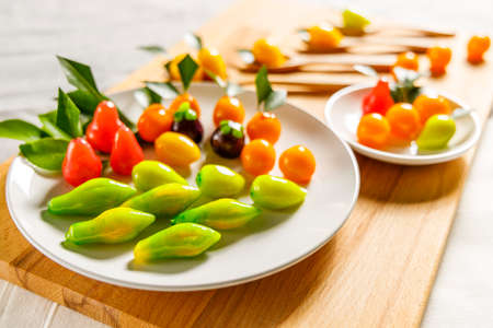 Deletable Imitation Fruits on wooden plateの写真素材