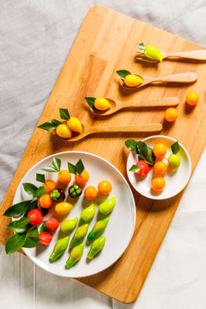 Deletable Imitation Fruits on wooden plateの写真素材