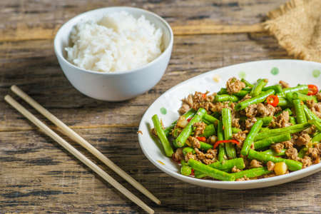 Stir fried long beans to eat with rice.の写真素材