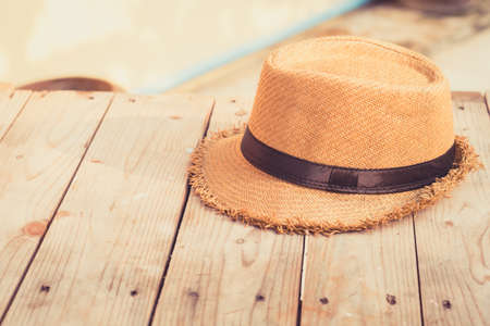 weave Hat on wood tableの写真素材