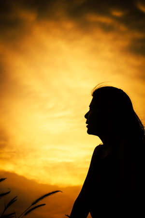 abstract Hope with silhouette womenの写真素材