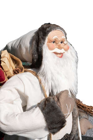 toy of Santa Claus with sack isolated on white background.の写真素材