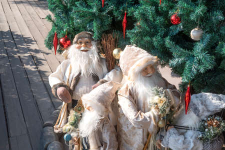Christmas decorations with santa claus on the wooden floorの写真素材