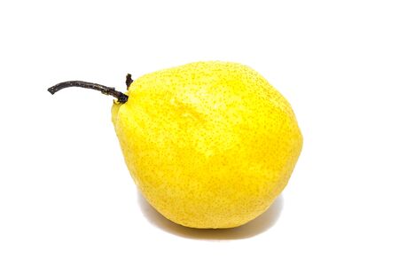 Pear white background appetizing bright yellow ball even harder.の写真素材