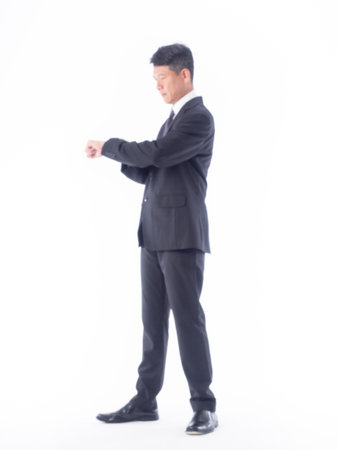 A asia businessman standing on whiteの写真素材