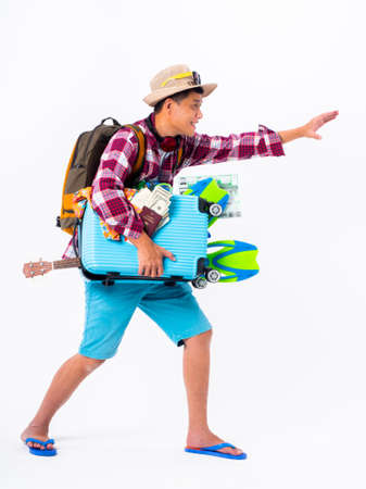 traveler concept.asian funny man wearing snorkel red plaid shirt,blue short and fins holding blank board,copy space isolated white background.の写真素材