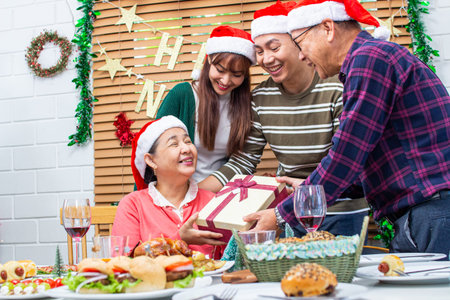 Happy family at Christmas dinner party