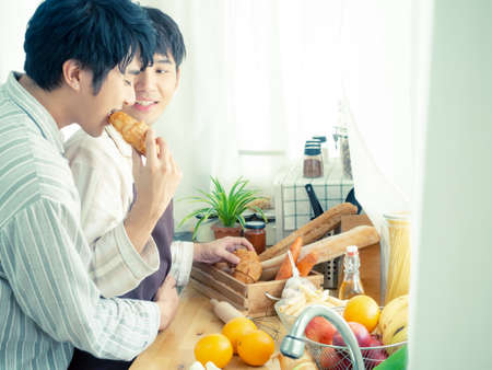 Couple gay concept. lgbtq actvity at home. cookingの写真素材