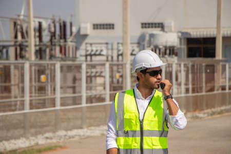 engineer team working in wind turbine farm. Renewable energy with wind generator by alternative energy concept.の写真素材