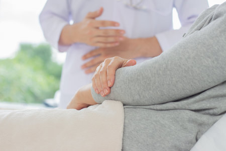 Doctor and patient in hospital. Healthcare and medical services. Doctor and patient.の写真素材