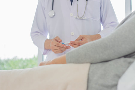 Doctor and patient discussing something while sitting at the table. Medicine and health care...