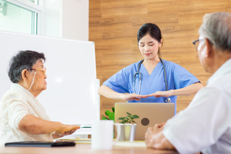 Asian senior patient discussing with doctor at hospital or medical clinic. Asian peopleの写真素材