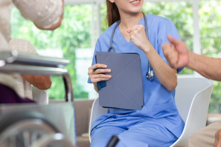 Doctor and patient in hospital. Medical healthcare and doctor staff service concept.の写真素材