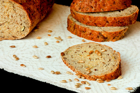 The cut wholegrain bread with sunflower seeds