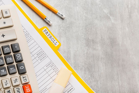 Calculator, pencil and stationery on grey background, flat lay. Space for text