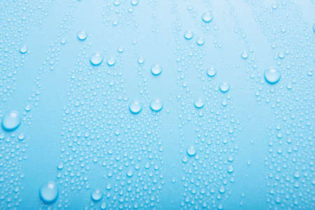 Water drops on a blue background. Water drops on a blue background.の写真素材